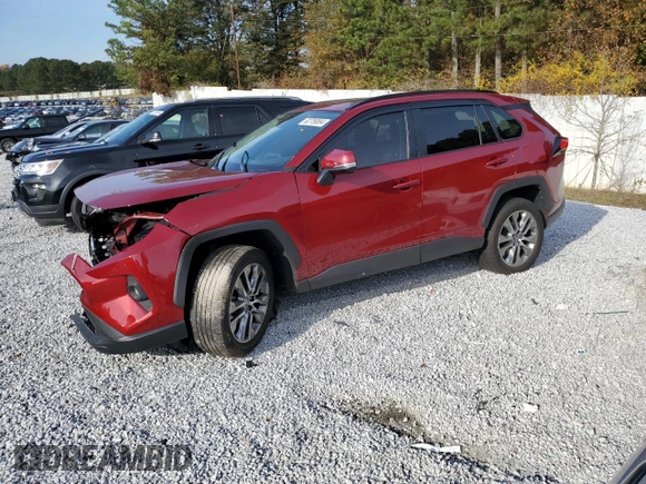 2022 Toyota RAV4 XLE Premium with VIN 2T3C1RFV5NW226684, listed as a Copart auction lot 82759894 with 19,722 mi miles and Salvage Title. Bid and sale history available at carsss.com. Image 1.