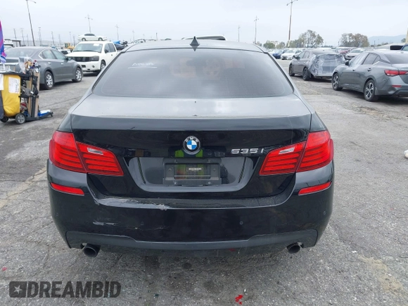 2015 BMW 5 Series 535i with VIN WBA5B1C55FG128387, listed as a IAAI auction lot 41885806 with 94,734 mi miles and . Bid and sale history available at carsss.com. Image 16.