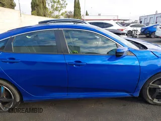 2019 Honda Civic Sport z VIN 19XFC2F8XKE014945, wystawiony jako IAAI lot #41662552 z przebiegiem 47 914 mil mil oraz . Historia ofert i sprzedaży dostępna na DreamBid. Obrazek 12.