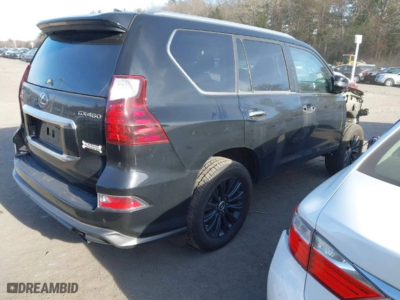 2022 Lexus GX with VIN JTJGM7BX9N5312069, listed as a IAAI auction lot 41230252 with 65,776 mi miles. Bid and sale history available at carsss.com. Image 4.