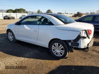 2009 Volkswagen Eos Komfort с VIN WVWAA71F79V011641, выставлен на аукционе Copart как лот 42577045 с пробегом 66 543 миль миль и Списание • Salvage title. История ставок и продаж доступна на DreamBid. Изображение 2.