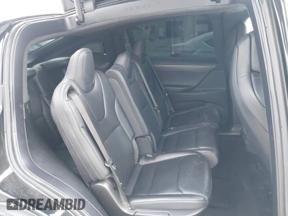 2017 Tesla Model X 90D with VIN 5YJXCAE2XHF075341, listed as a IAAI auction lot 41784008 with 77,439 mi miles and . Bid and sale history available at DreamBid. Image 8.