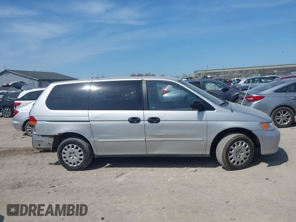 2002 Honda Odyssey LX z VIN 2HKRL18532H567409, wystawiony jako IAAI lot #42069502 z przebiegiem 173 662 mil mil oraz . Historia ofert i sprzedaży dostępna na DreamBid. Obrazek 14.