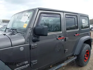 2014 Jeep Wrangler Unlimited Sport with VIN 1C4BJWDG6EL239378, listed as a IAAI auction lot 42073392 with 120,999 mi miles. Bid and sale history available at carsss.com. Image 15.