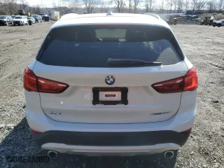 2020 BMW X1 xDrive28i with VIN WBXJG9C00L5P60455, listed as a Copart auction lot 52353875 with 77,709 mi miles and Salvage Title. Bid and sale history available at carsss.com. Image 6.