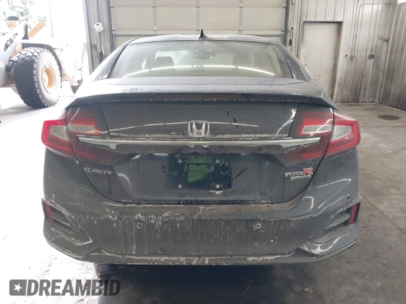 2018 Honda Clarity Touring z VIN JHMZC5F39JC002521, wystawiony jako IAAI lot #41428968 z przebiegiem 64 014 mil mil oraz . Historia ofert i sprzedaży dostępna na DreamBid. Obrazek 17.