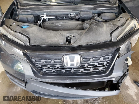 2020 Honda Passport EX-L with VIN 5FNYF8H57LB011549, listed as a Copart auction lot 59123735 with 127,797 mi miles and Salvage title. Bid and sale history available at DreamBid. Image 12.