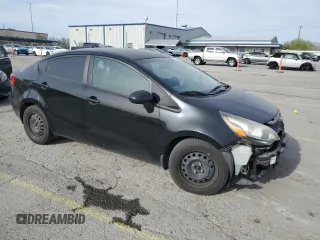 2014 Kia Rio LX with VIN KNADM4A36E6370196, listed as a Copart auction lot 52152155 with 123,672 mi miles and Salvage Title. Bid and sale history available at DreamBid. Image 4.