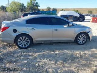 2015 Buick LaCrosse Leather with VIN 1G4GB5G38FF208621, listed as a IAAI auction lot 41828107 with 300,883 mi miles. Bid and sale history available at carsss.com. Image 13.