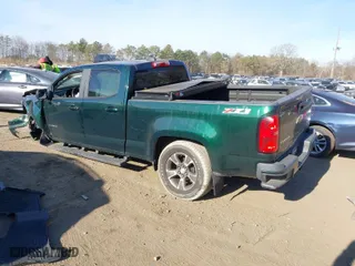 2015 Chevrolet Colorado 4WD Z71 with VIN 1GCGTCE31F1163947, listed as a IAAI auction lot 40997814 with 101,884 mi miles. Bid and sale history available at carsss.com. Image 3.