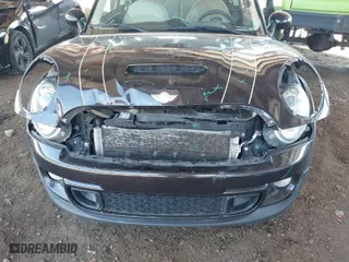 2013 MINI Cooper Hardtop S with VIN WMWSV3C5XDT480004, listed as a IAAI auction lot 41885248 with 148,419 mi miles. Bid and sale history available at carsss.com. Image 6.