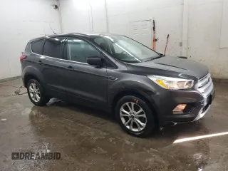 2019 Ford Escape SE z VIN 1FMCU0GD5KUC49556, wystawiony jako Copart lot #57911145 z przebiegiem 89 152 mil mil oraz Czysty tytuł • Clean title. Historia ofert i sprzedaży dostępna na DreamBid. Obrazek 4.