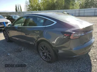 2018 Tesla Model 3 Long Range Battery z VIN 5YJ3E1EB1JF119368, wystawiony jako Copart lot #54059834 z przebiegiem 49 216 mil mil oraz Szkody całkowita. Historia ofert i sprzedaży dostępna na DreamBid. Obrazek 2.