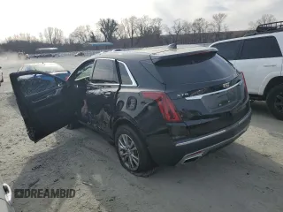 2023 Cadillac XT5 FWD Premium Luxury z VIN 1GYKNCRS6PZ145494, wystawiony jako Copart lot #45475375 z przebiegiem 48 339 mil mil oraz Szkoda całkowita • Salvage title. Historia ofert i sprzedaży dostępna na DreamBid. Obrazek 2.