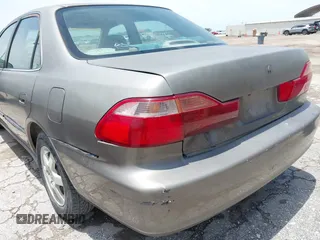 2000 Honda Accord SE z VIN 1HGCG5673YA090469, wystawiony jako IAAI lot #42391254 z przebiegiem 140 819 mil mil oraz . Historia ofert i sprzedaży dostępna na DreamBid. Obrazek 6.