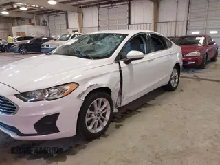 2020 Ford Fusion Hybrid SE with VIN 3FA6P0LU7LR173500, listed as a IAAI auction lot 41368311 with 105,202 mi miles. Bid and sale history available at carsss.com. Image 6.