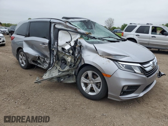 2019 Honda Odyssey EX-L z VIN 5FNRL6H7XKB049729, wystawiony jako Copart lot #55953075 z przebiegiem 129 194 mil mil oraz Szkoda całkowita • Salvage title. Historia ofert i sprzedaży dostępna na DreamBid. Obrazek 4.