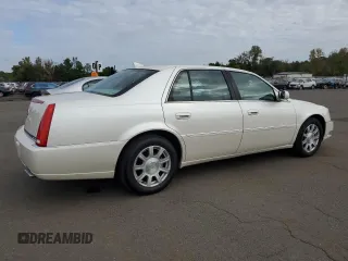 2011 Cadillac DTS z VIN 1G6KA5E61BU104530, wystawiony jako Copart lot #74100794 z przebiegiem 167 373 mil mil oraz Szkoda całkowita • Salvage title. Historia ofert i sprzedaży dostępna na DreamBid. Obrazek 3.