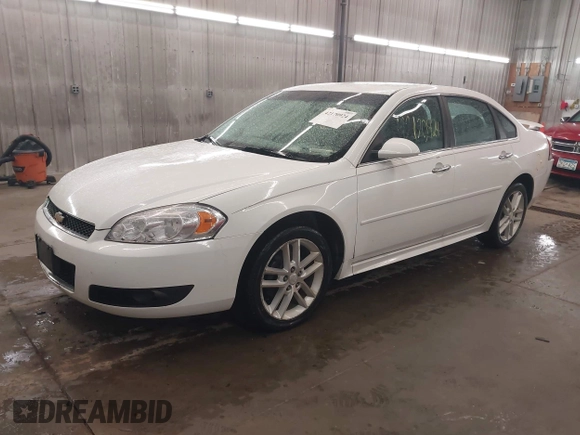 2012 Chevrolet Impala LTZ with VIN 2G1WC5E33C1331027, listed as a IAAI auction lot 42170924 with 211,065 mi miles and . Bid and sale history available at DreamBid. Image 2.