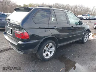 2006 BMW X5 4.4i with VIN 5UXFB53506LV22836, listed as a IAAI auction lot 41727708 with 186,084 mi miles. Bid and sale history available at carsss.com. Image 4.