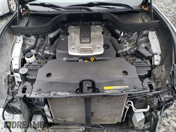 2017 Infiniti QX70 z VIN JN8CS1MW5HM414492, wystawiony jako Copart lot #52415495 z przebiegiem 123 095 mil mil oraz Szkoda całkowita • Salvage title. Historia ofert i sprzedaży dostępna na DreamBid. Obrazek 12.