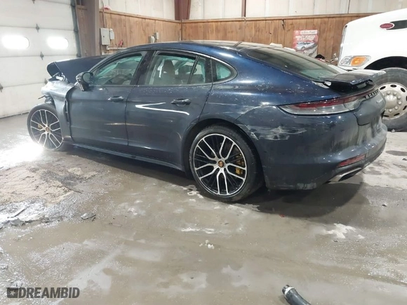 2021 Porsche Panamera with VIN WP0AJ2A78ML121162, listed as a IAAI auction lot 41560345 with 89,775 mi miles. Bid and sale history available at carsss.com. Image 3.