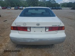 2001 Toyota Camry LE z VIN JT2BF22K310305858, wystawiony jako Copart lot #55231305 z przebiegiem 149 104 mil mil oraz Nie do naprawy • Non repairable. Historia ofert i sprzedaży dostępna na DreamBid. Obrazek 6.