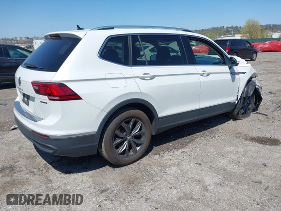 2023 Volkswagen Tiguan SE with VIN 3VVMB7AX4PM128427, listed as a IAAI auction lot 42054477 with 29,731 mi miles and . Bid and sale history available at DreamBid. Image 4.