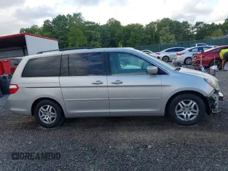 2006 Honda Odyssey EX z VIN 5FNRL38406B403736, wystawiony jako IAAI lot #42288117 z przebiegiem 159 686 mil mil oraz . Historia ofert i sprzedaży dostępna na DreamBid. Obrazek 14.