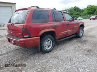2000 Dodge Durango z VIN 1B4HS28N8YF101866, wystawiony jako IAAI lot #42377212 z przebiegiem 139 541 mil mil oraz . Historia ofert i sprzedaży dostępna na DreamBid. Obrazek 4.