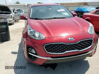 2020 Kia Sportage EX with VIN KNDPNCAC5L7708606, listed as a Copart auction lot 56987605 with 99,018 mi miles and Salvage title. Bid and sale history available at DreamBid. Image 14.