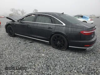 2021 Audi A8 with VIN WAU8EAF82MN013779, listed as a Copart auction lot 86869184 with 0 mi miles and Salvage Title. Bid and sale history available at carsss.com. Image 2.