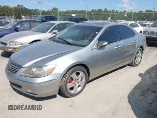 2007 Acura RL Tech Pkg with VIN JH4KB16647C004578, listed as a IAAI auction lot 42062919 with 162,968 mi miles. Bid and sale history available at carsss.com. Image 2.