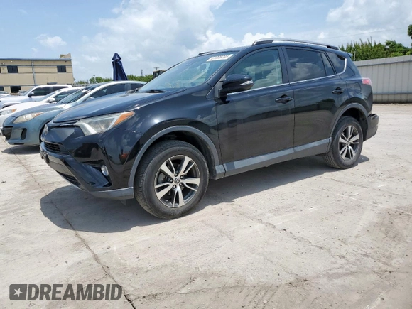 2018 Toyota RAV4 XLE with VIN 2T3WFREV2JW433186, listed as a Copart auction lot 61008705 with 57,310 mi miles and Salvage title. Bid and sale history available at DreamBid. Image 1.