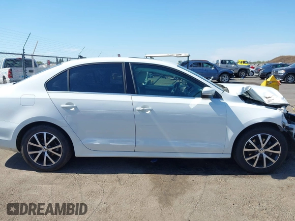 2017 Volkswagen Jetta SE with VIN 3VWDB7AJ7HM209222, listed as a IAAI auction lot 42655859 with 127,468 mi miles and . Bid and sale history available at DreamBid. Image 14.