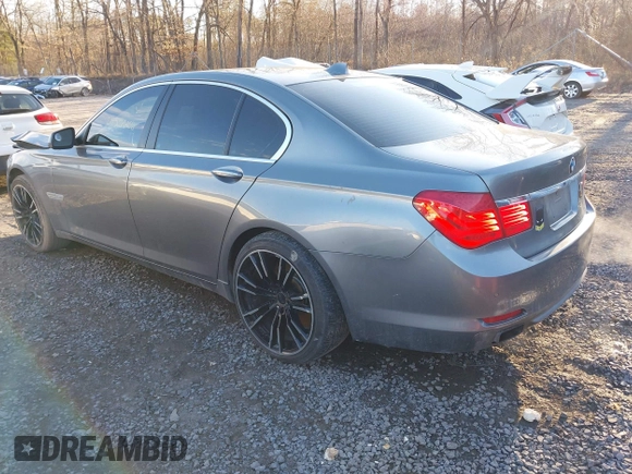 2011 BMW 7 Series 750i xDrive with VIN WBAKC6C58BC394310, listed as a IAAI auction lot 41226102 with 183,907 mi miles and . Bid and sale history available at DreamBid. Image 3.