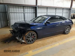 2012 BMW 6 Series 650i with VIN WBALZ3C51CDL71044, listed as a Copart auction lot 88372315 with 129,701 mi miles and Salvage Title. Bid and sale history available at carsss.com. Image 1.