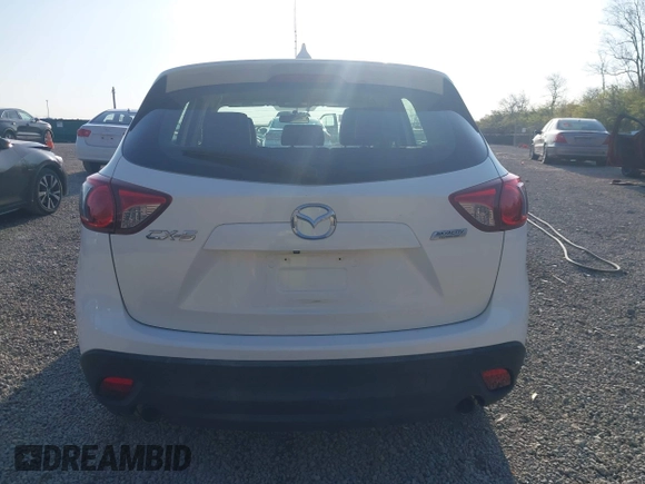 2016 Mazda CX-5 Sport with VIN JM3KE2BY2G0819604, listed as a IAAI auction lot 42059846 with 124,911 mi miles. Bid and sale history available at carsss.com. Image 16.