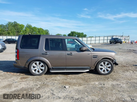 2015 Land Rover LR4 HSE z VIN SALAG2V69FA765454, wystawiony jako IAAI lot #42561781 z przebiegiem 99 115 mil mil oraz . Historia ofert i sprzedaży dostępna na DreamBid. Obrazek 13.