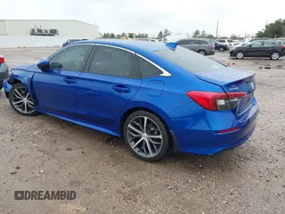 2023 Honda Civic Touring z VIN 2HGFE1F92PH317695, wystawiony jako IAAI lot #41556915 z przebiegiem 20 421 mil mil oraz . Historia ofert i sprzedaży dostępna na DreamBid. Obrazek 3.