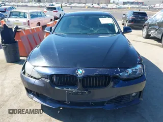 2015 BMW 3 Series 328i with VIN WBA3C1C50FK124300, listed as a IAAI auction lot 40112372 with 142,591 mi miles and . Bid and sale history available at carsss.com. Image 12.
