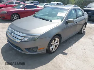 2012 Ford Fusion SE with VIN 3FAHP0HA4CR203446, listed as a IAAI auction lot 42093330 with 185,703 mi miles. Bid and sale history available at carsss.com. Image 2.
