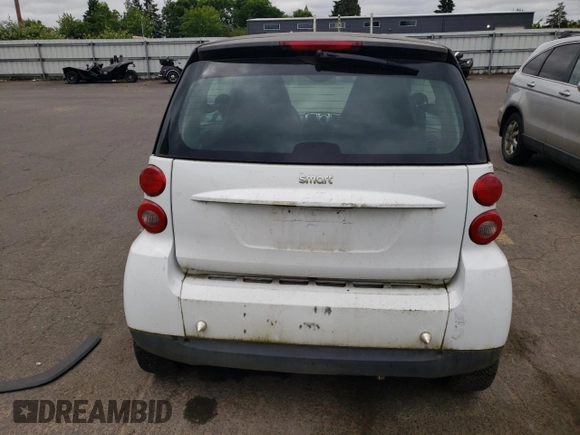 2012 Smart fortwo Pure с VIN WMEEJ3BA1CK573090, выставлен на аукционе Copart как лот 59881025 с пробегом 128 086 миль миль и Чистый • Clean title. История ставок и продаж доступна на DreamBid. Изображение 6.