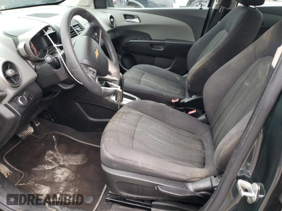 2013 Chevrolet Sonic LT with VIN 1G1JC5SB9D4193568, listed as a Copart auction lot 48080025 with 97,370 mi miles and Salvage Title. Bid and sale history available at DreamBid. Image 7.