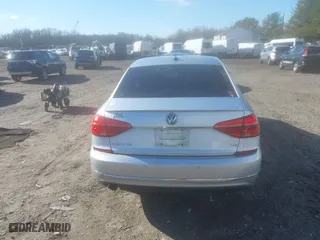 2016 Volkswagen Passat 1.8T SEL with VIN 1VWCT7A35GC011006, listed as a IAAI auction lot 41039744 with 123,422 mi miles. Bid and sale history available at carsss.com. Image 16.