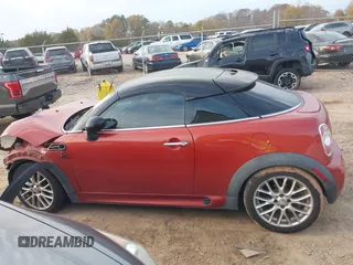 2015 MINI Coupe z VIN WMWSX1C54FT508123, wystawiony jako IAAI lot #40974103 z przebiegiem 79 035 mil mil oraz . Historia ofert i sprzedaży dostępna na DreamBid. Obrazek 14.