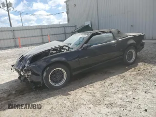 1991 Pontiac Firebird z VIN 1G2FW33F3ML244342, wystawiony jako Copart lot #77467044 z przebiegiem 107 204 mil mil oraz Szkoda całkowita • Salvage title. Historia ofert i sprzedaży dostępna na DreamBid. Obrazek 1.