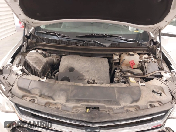 2021 Chevrolet Traverse Premier with VIN 1GNEVKKW7MJ218772, listed as a IAAI auction lot 42306743 with 106,898 mi miles and . Bid and sale history available at DreamBid. Image 10.