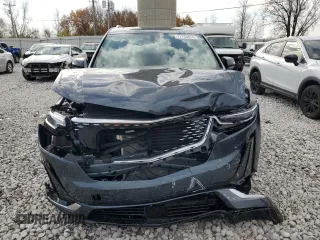 2021 Cadillac XT6 Premium Luxury with VIN 1GYKPFRS8MZ132642, listed as a Copart auction lot 77756874 with 33,415 mi miles and Non repairable. Bid and sale history available at DreamBid. Image 5.