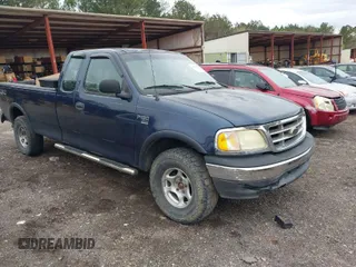 2003 Ford F-150 XL with VIN 1FTRX18L63NB59927, listed as a IAAI auction lot 41842559 with 1 mi miles. Bid and sale history available at carsss.com. Image 1.
